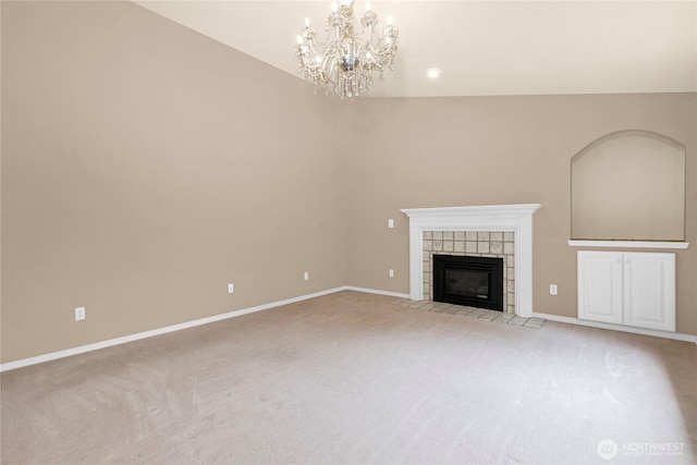 2222 60th Ln NW, Olympia, WA 98502 - unfurnished living room with light colored carpet, a chandelier, a fireplace, and baseboards