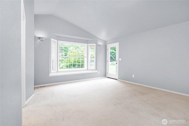 2222 60th Ln NW, Olympia, WA 98502 - carpeted empty room featuring lofted ceiling and baseboards