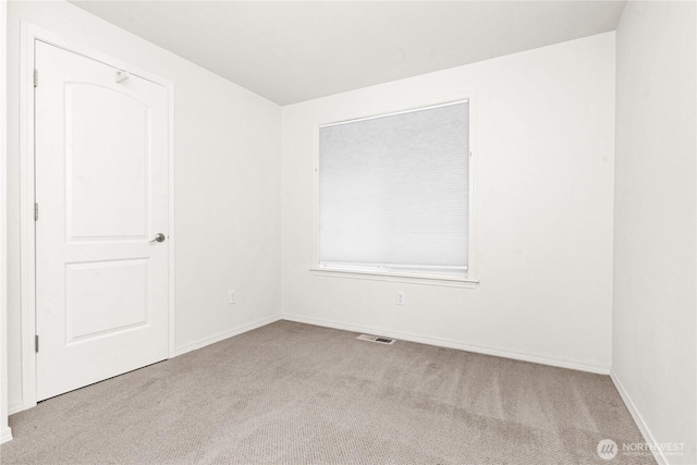 2222 60th Ln NW, Olympia, WA 98502 - empty room featuring carpet floors and baseboards