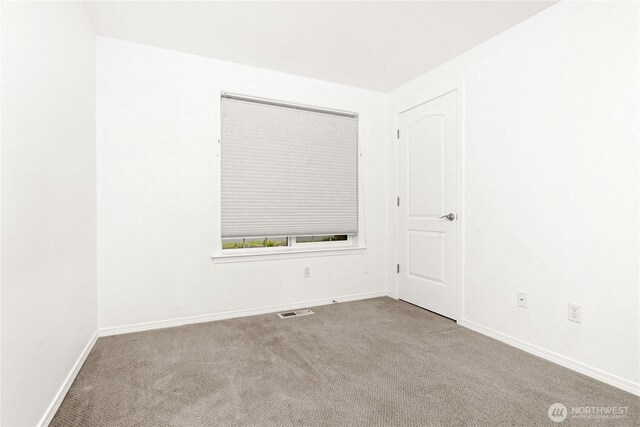 2222 60th Ln NW, Olympia, WA 98502 - spare room with carpet floors and baseboards