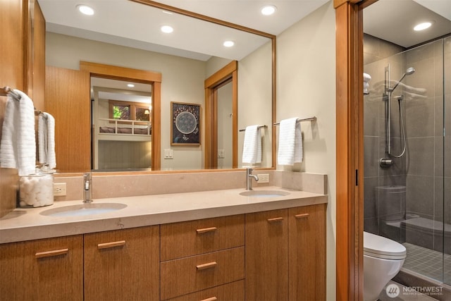 21402 S Herron Rd NW, Lakebay, WA 98349 - bathroom with a stall shower, toilet, recessed lighting, and double vanity