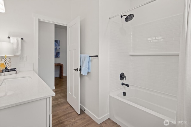 12713 176th Ave E, Bonney Lake, WA 98391 - full bath with shower / bath combo with shower curtain, vanity, and wood finished floors
