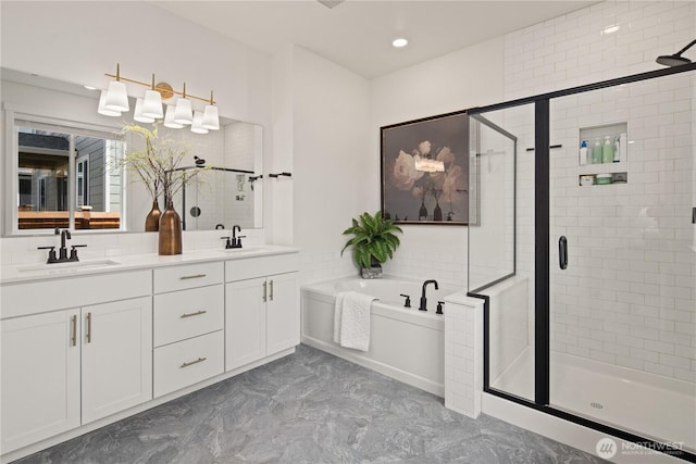 12713 176th Ave E, Bonney Lake, WA 98391 - full bathroom featuring a shower stall, double vanity, a bath, marble finish flooring, and recessed lighting