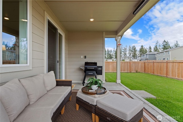 12713 176th Ave E, Bonney Lake, WA 98391 - fenced backyard with outdoor lounge area, area for grilling, and a patio area
