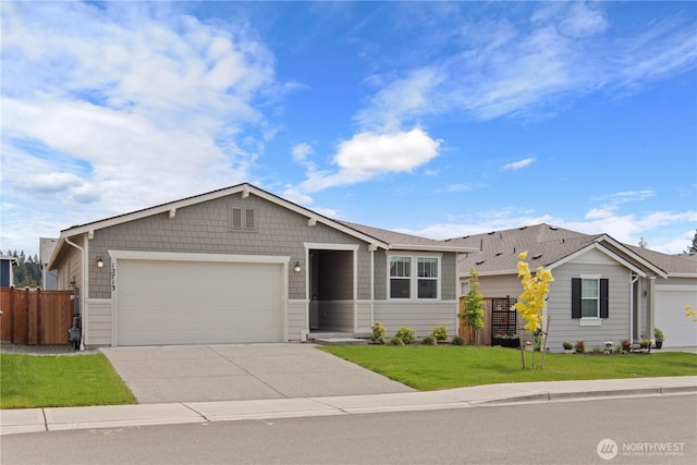 12713 176th Ave E, Bonney Lake, WA 98391 - single story home with concrete driveway and a garage