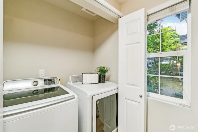 13015 102nd Ln NE Unit 2, Kirkland, WA 98034 - washroom with independent washer and dryer and plenty of natural light