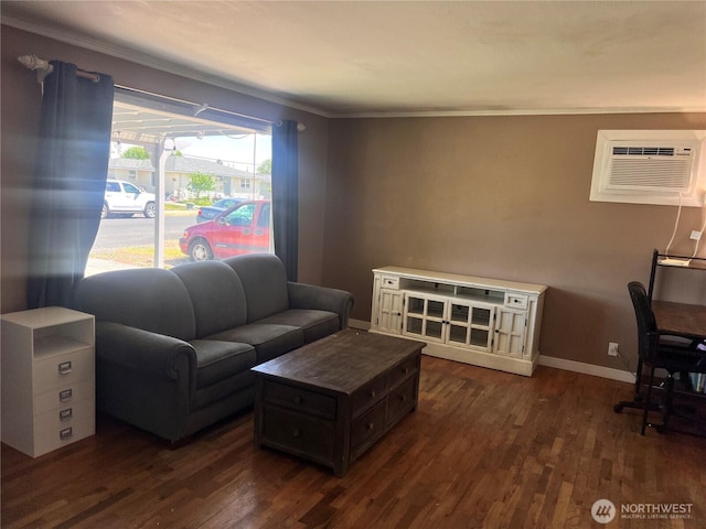 235 Ivy St NE, Ephrata, WA 98823 - living room with ornamental molding, dark wood-type flooring, baseboards, and a wall mounted air conditioner