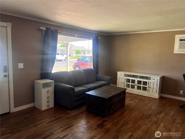 235 Ivy St NE, Ephrata, WA 98823 - living room featuring ornamental molding, dark wood-style floors, baseboards, and a wall mounted AC