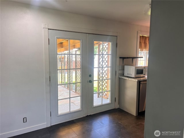 235 Ivy St NE, Ephrata, WA 98823 - entryway featuring french doors and dark tile patterned floors