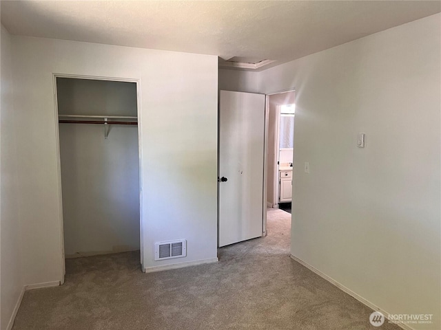 235 Ivy St NE, Ephrata, WA 98823 - unfurnished bedroom with carpet flooring, baseboards, and a closet
