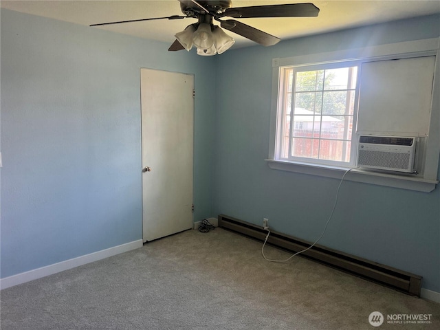235 Ivy St NE, Ephrata, WA 98823 - carpeted empty room featuring a baseboard heating unit, a ceiling fan, cooling unit, and baseboards