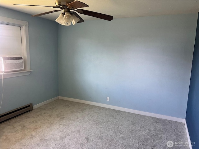 235 Ivy St NE, Ephrata, WA 98823 - carpeted empty room featuring a ceiling fan, cooling unit, a baseboard radiator, and baseboards