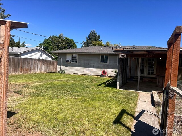 235 Ivy St NE, Ephrata, WA 98823 - rear view of property with french doors and a patio area