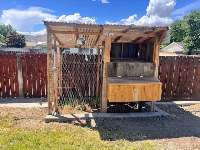 235 Ivy St NE, Ephrata, WA 98823 - view of yard featuring exterior structure, fence, and an outdoor structure