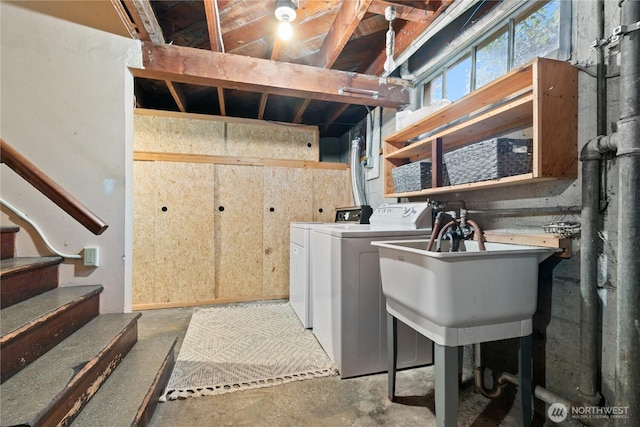 laundry room with separate washer and dryer