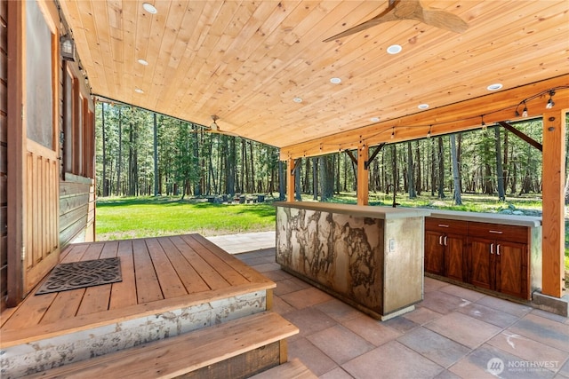 view of patio with a ceiling fan