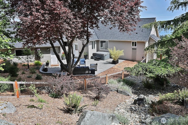 4638 Tanner View Dr, Clinton, WA 98236 - view of front of property featuring a patio, a shingled roof, fence, and an outdoor hangout area