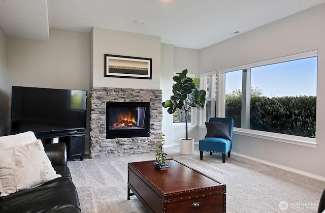 4638 Tanner View Dr, Clinton, WA 98236 - carpeted living room with baseboards and a stone fireplace