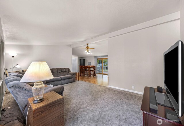 846 Deep Valley Dr, Maple Falls, WA 98266 - carpeted living room featuring a ceiling fan, vaulted ceiling, and baseboards