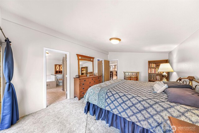 846 Deep Valley Dr, Maple Falls, WA 98266 - carpeted bedroom with ensuite bath and tile patterned flooring