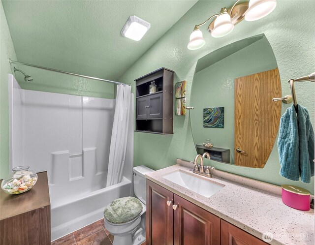 846 Deep Valley Dr, Maple Falls, WA 98266 - bathroom with toilet, vanity, shower / bath combo, a textured wall, and lofted ceiling