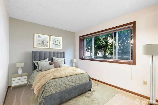 12840 SE 40th Ct Unit B2, Bellevue, WA 98006 - carpeted bedroom featuring baseboards and a textured ceiling