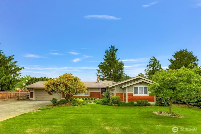 321 Park Pl, Lynden, WA 98264 - single story home with an attached garage, driveway, and a chimney