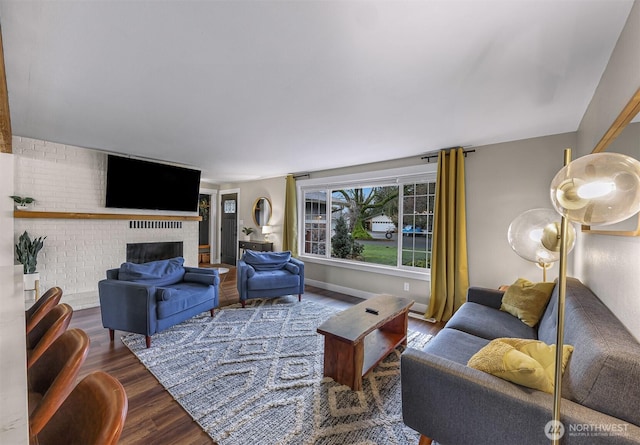321 Park Pl, Lynden, WA 98264 - living room with wood finished floors and a brick fireplace