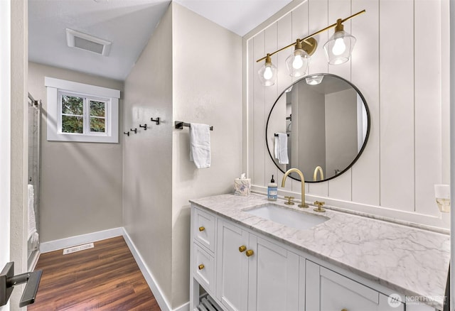 321 Park Pl, Lynden, WA 98264 - full bath featuring baseboards, wood finished floors, and vanity