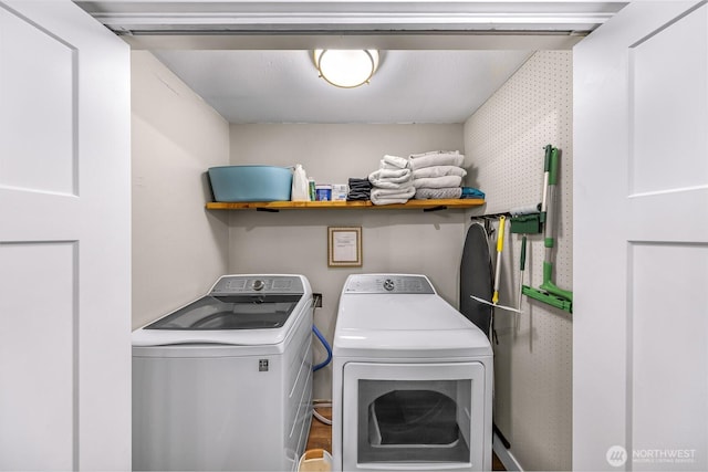 321 Park Pl, Lynden, WA 98264 - washroom featuring washing machine and dryer and wood finished floors