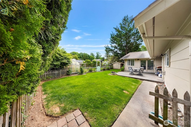 321 Park Pl, Lynden, WA 98264 - view of yard with a shed, a patio area, and an outdoor structure