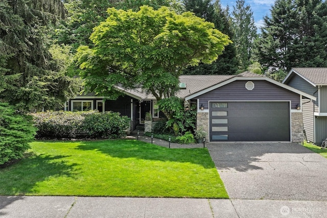 view of front facade featuring stone siding, a garage, a front lawn, and asphalt driveway