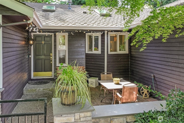 property entrance with a patio area