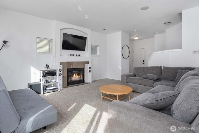 1339 E 51st St, Tacoma, WA 98404 - living room featuring carpet flooring and a tiled fireplace