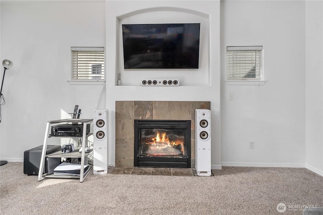 1339 E 51st St, Tacoma, WA 98404 - detailed view of carpet floors, a tiled fireplace, and baseboards