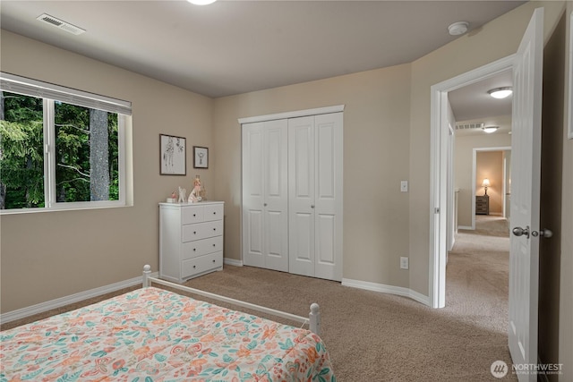 3677 SE Chesterton Dr, Port Orchard, WA 98366 - bedroom featuring carpet flooring, a closet, and baseboards