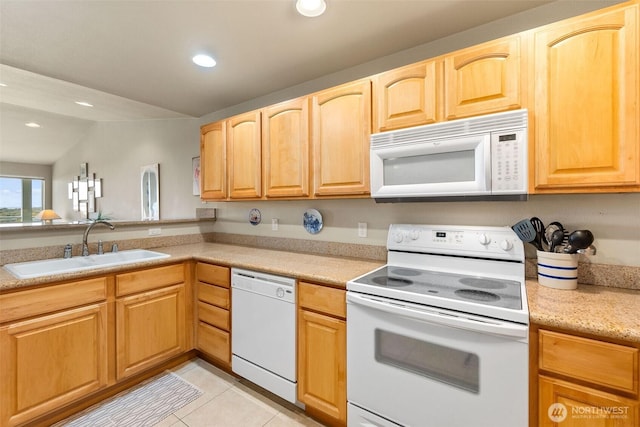 kitchen with white appliances, a sink, recessed lighting, light countertops, and light tile patterned floors