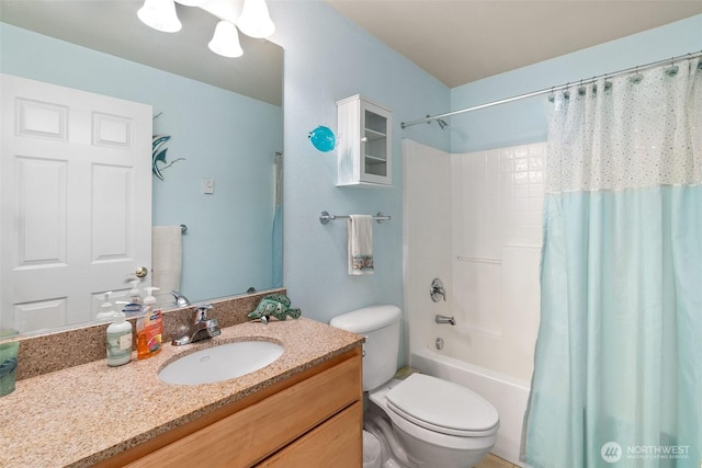 full bath featuring toilet, vanity, and shower / tub combo with curtain