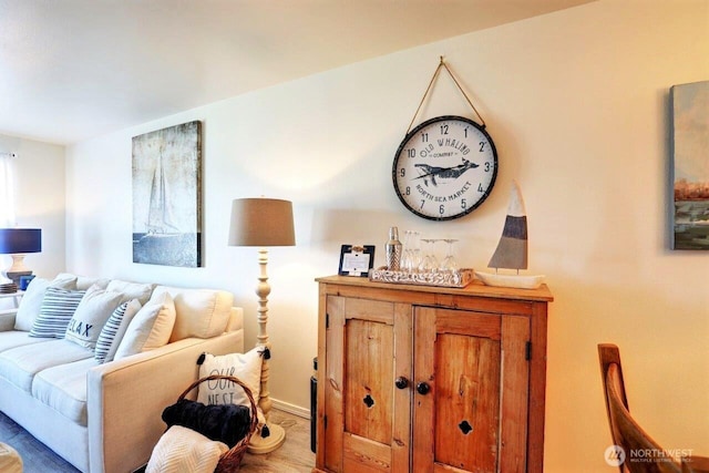 1515 Ocean Beach Blvd Unit 202, Long Beach, WA 98631 - living room featuring wood finished floors and a bar