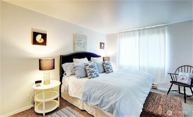 1515 Ocean Beach Blvd Unit 202, Long Beach, WA 98631 - bedroom with carpet flooring, baseboards, and a baseboard radiator