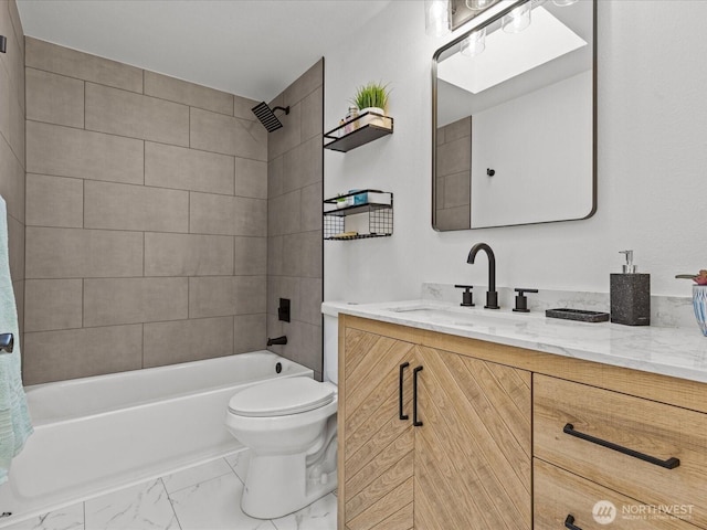 bathroom with marble look tiles, toilet, shower / bath combination, and vanity