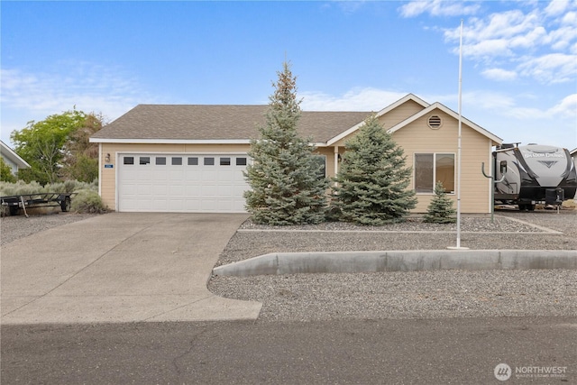 336 Spring Cir SW, Mattawa, WA 99349 - view of front of house featuring concrete driveway and a garage
