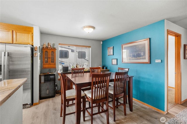 336 Spring Cir SW, Mattawa, WA 99349 - dining space with light wood-style flooring and baseboards