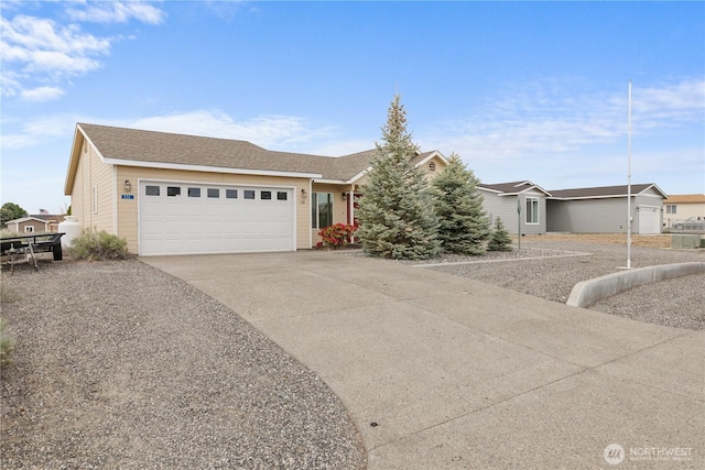 336 Spring Cir SW, Mattawa, WA 99349 - view of front of property with concrete driveway and an attached garage