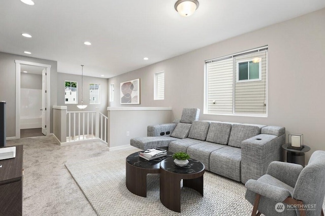 4933 Wanderlust Way, Gig Harbor, WA 98332 - carpeted living room with healthy amount of natural light, recessed lighting, and baseboards