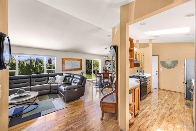 8224 Quinault Rd, Blaine, WA 98230 - living room with light wood finished floors and a ceiling fan