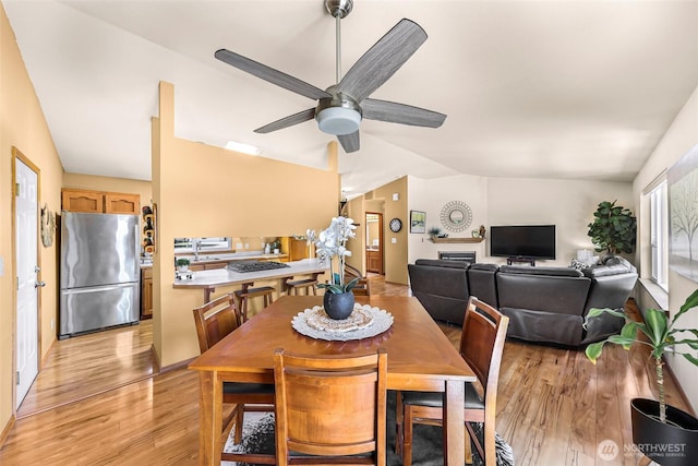 8224 Quinault Rd, Blaine, WA 98230 - dining room with light wood-type flooring, a ceiling fan, and lofted ceiling