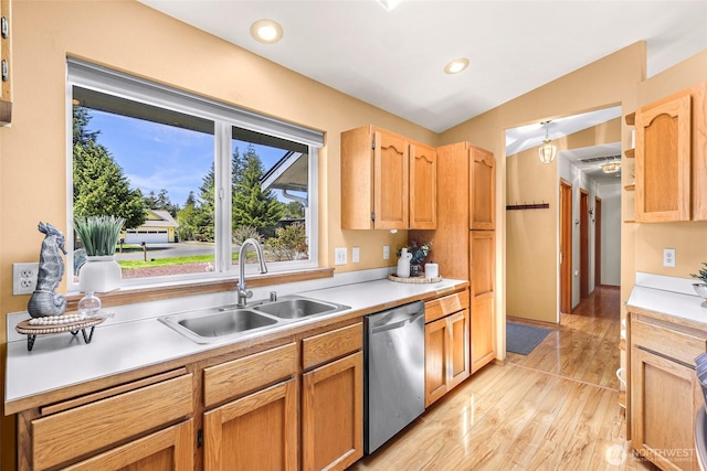 8224 Quinault Rd, Blaine, WA 98230 - kitchen featuring dishwasher, a sink, light countertops, light wood-style floors, and recessed lighting