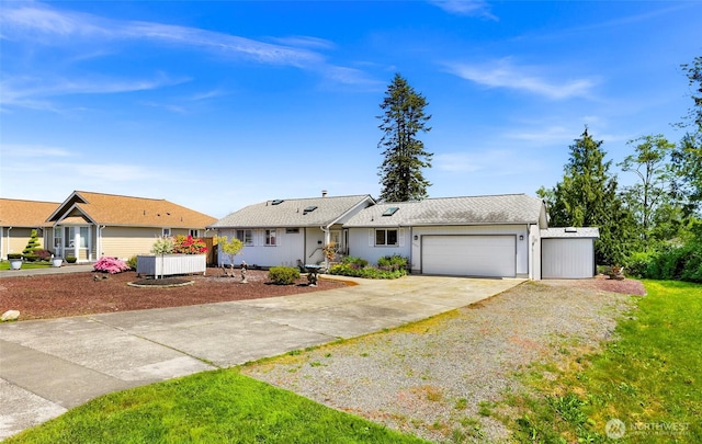 8224 Quinault Rd, Blaine, WA 98230 - ranch-style house featuring concrete driveway and an attached garage