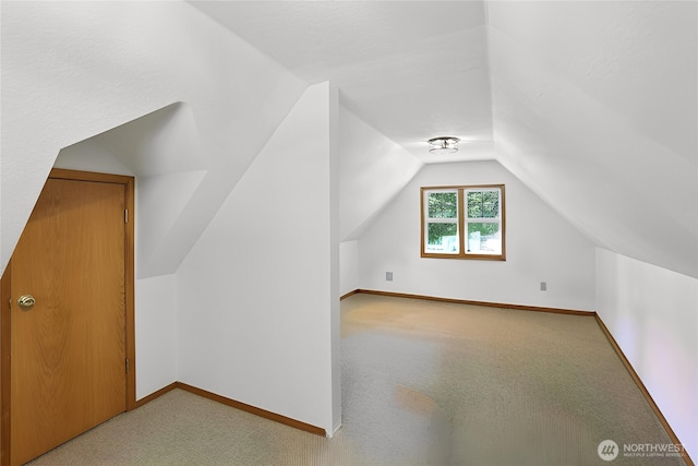 15513 NE Beebe Rd, Battle Ground, WA 98604 - additional living space featuring carpet, lofted ceiling, and baseboards